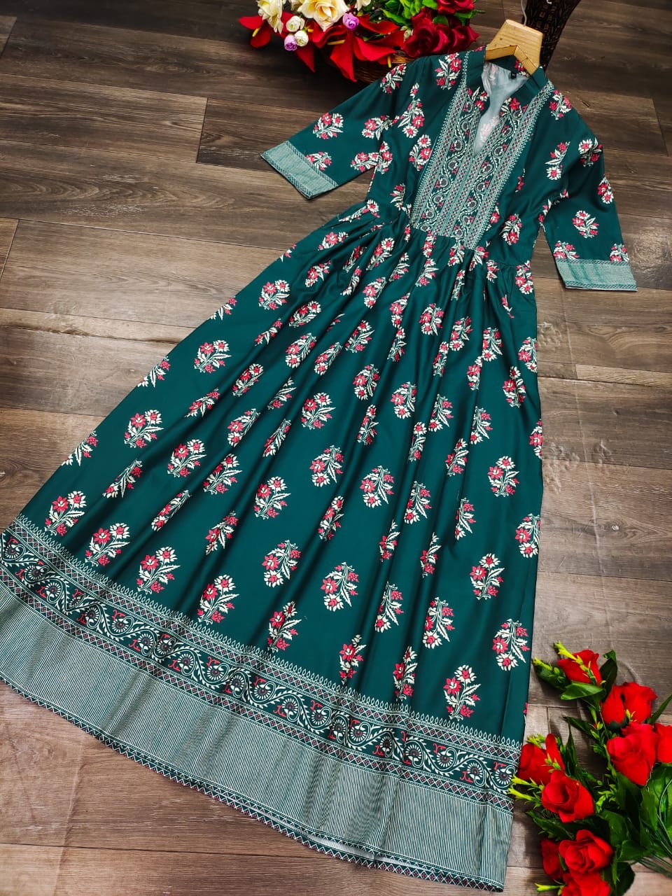 FULL FLAIRED GOWN WITH DIGITAL PRINT & LACE BORDER ON FULL BOTTOM , SLEEVES WITH LACE & CHOLI WITH TIE LACE